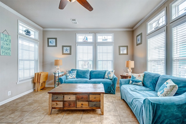 tiled living room with crown molding, ceiling fan, and a healthy amount of sunlight