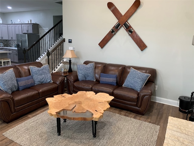 living room featuring dark hardwood / wood-style flooring