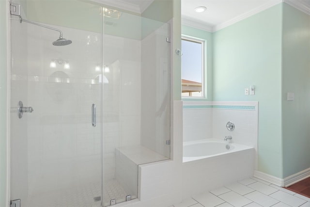 bathroom with a garden tub, crown molding, a stall shower, baseboards, and tile patterned floors