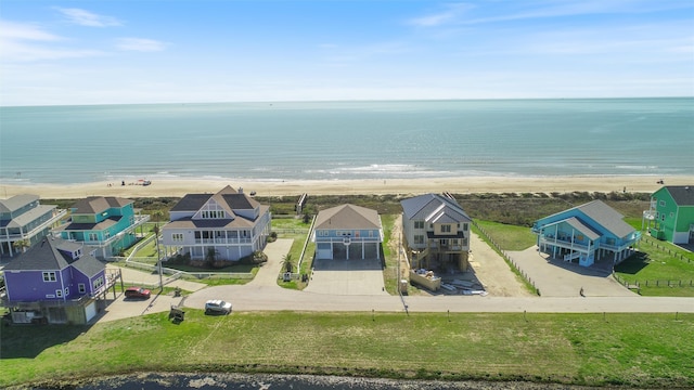 aerial view with a view of the beach and a water view