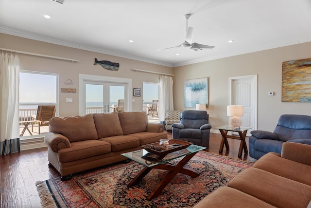 living room featuring dark wood-type flooring, french doors, crown molding, and ceiling fan