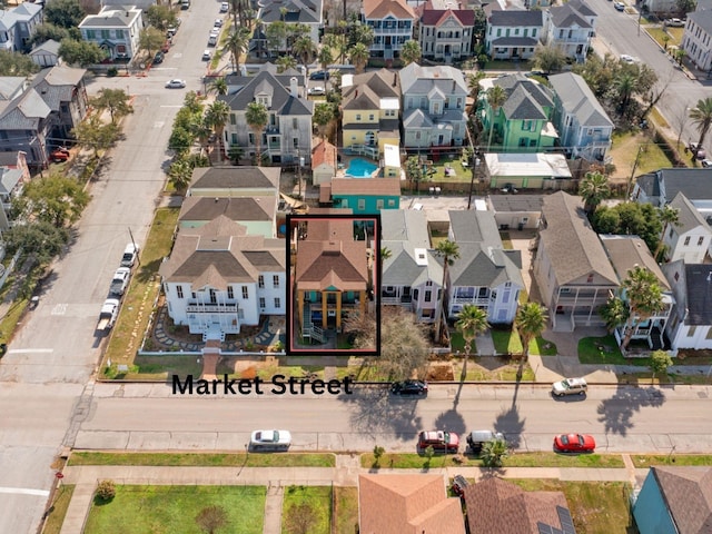 birds eye view of property with a residential view