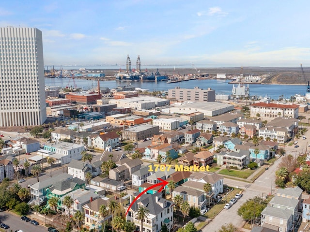 bird's eye view with a city view and a water view