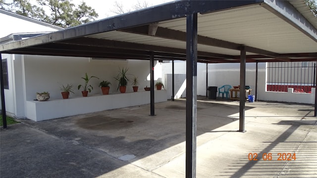 view of parking with a carport