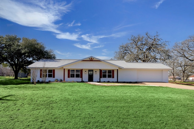 single story home with a front yard and a garage