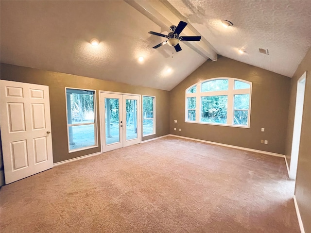 bonus room featuring ceiling fan, a textured ceiling, vaulted ceiling with beams, light carpet, and french doors