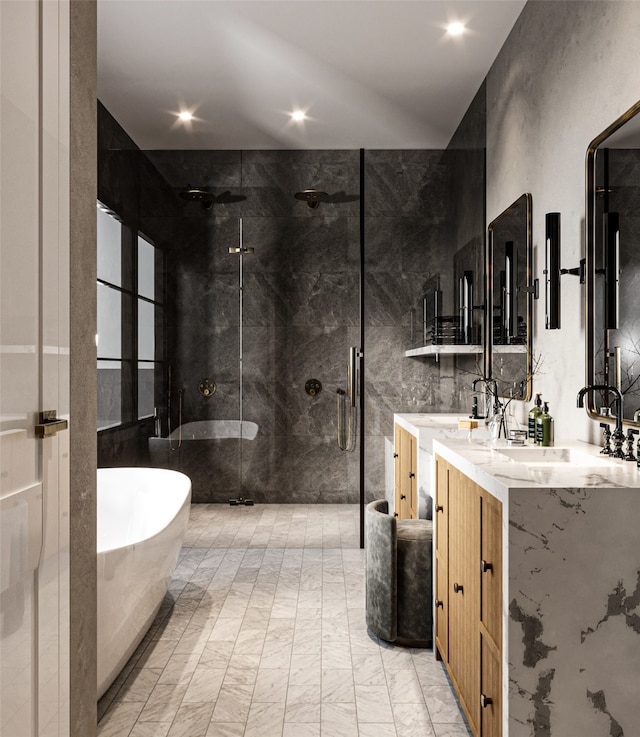 bathroom featuring shower with separate bathtub, tile floors, oversized vanity, and tile walls