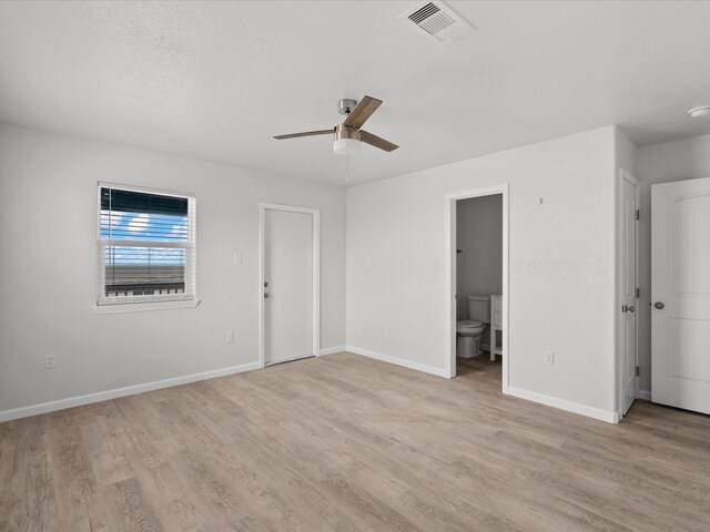 interior space with ceiling fan and light hardwood / wood-style floors