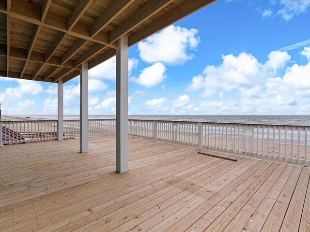 deck featuring a water view