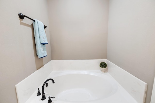 bathroom with a washtub