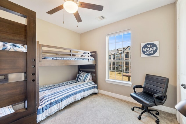 bedroom with light carpet and ceiling fan