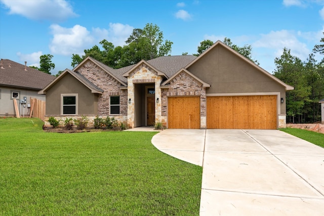 view of front facade with a front lawn and a garage