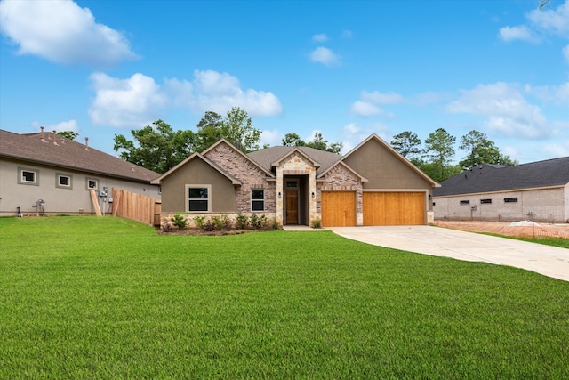 view of front of house with a front lawn and a garage