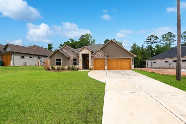 view of front of house featuring a front yard and a garage