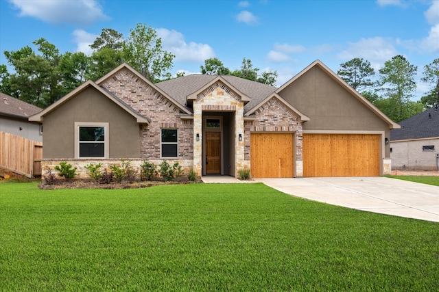 view of front facade with a front lawn and a garage