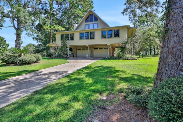 view of front facade featuring a garage and a front yard