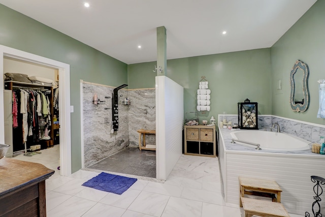 bathroom with vanity and a bathtub