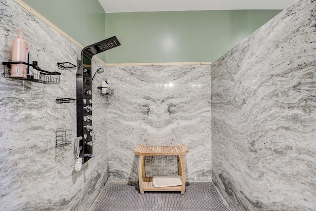 bathroom featuring tile walls and tile patterned flooring