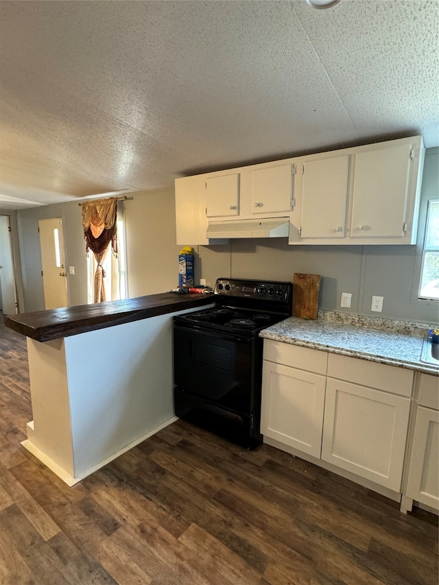 kitchen with a textured ceiling, kitchen peninsula, white cabinets, black / electric stove, and dark hardwood / wood-style flooring