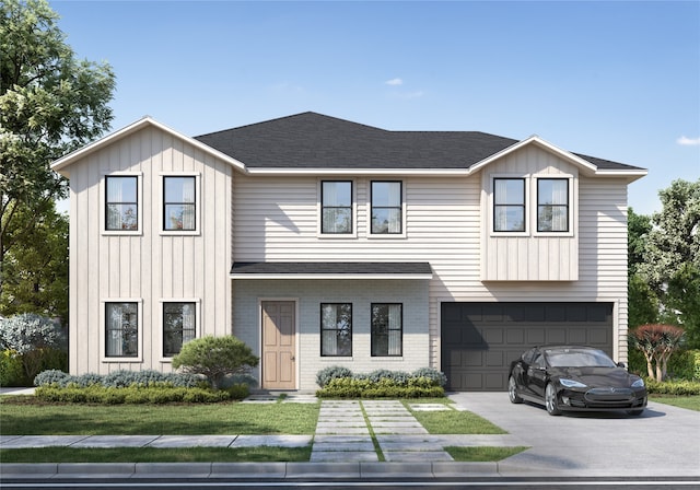 view of front facade with a front yard and a garage