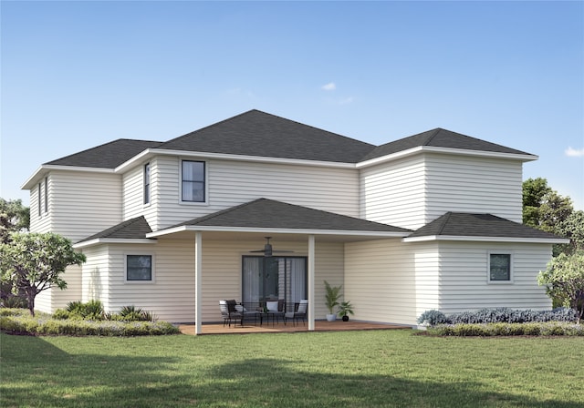 rear view of property with a lawn