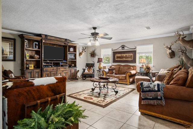 living room featuring a textured ceiling, crown molding, ceiling fan, and light tile flooring