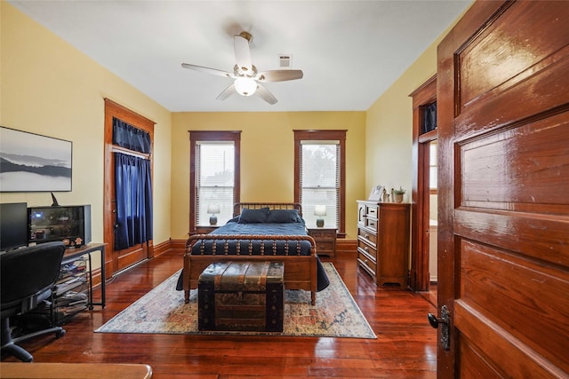 bedroom featuring dark hardwood / wood-style floors and ceiling fan