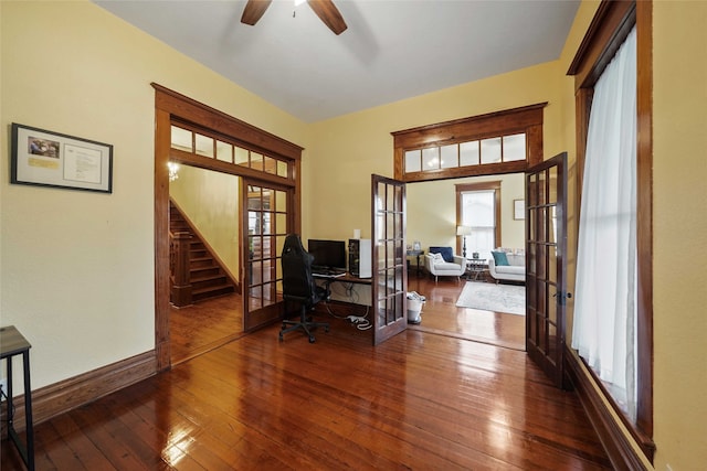 office space with dark hardwood / wood-style flooring, ceiling fan, and french doors