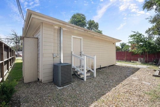 view of outdoor structure featuring central AC