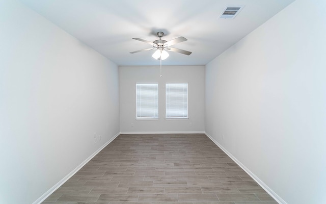 unfurnished room with light hardwood / wood-style floors and ceiling fan