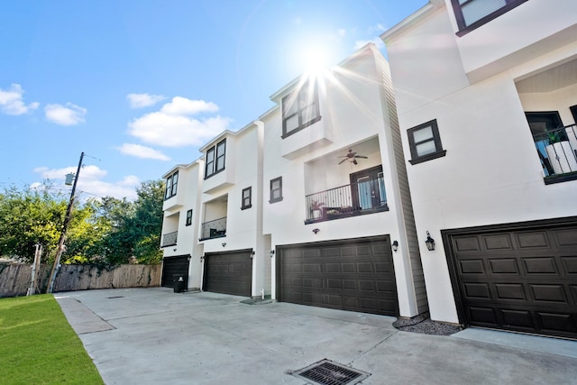 exterior space with a balcony and a garage