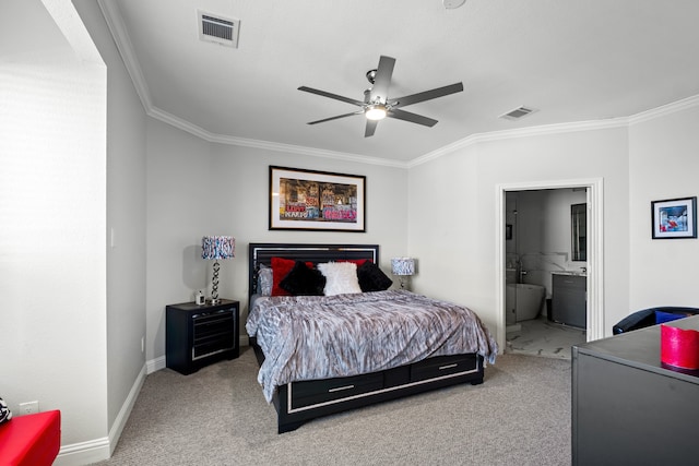 bedroom featuring light carpet, ensuite bathroom, ornamental molding, and ceiling fan