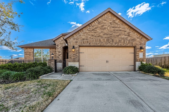 view of front of property with a garage