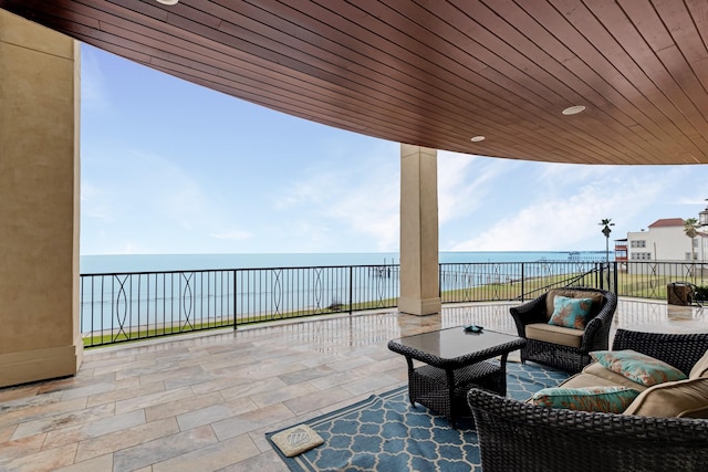 view of patio featuring an outdoor hangout area and a water view