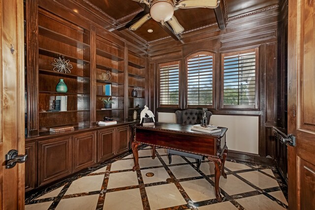 office with coffered ceiling, ceiling fan, ornamental molding, and light tile floors