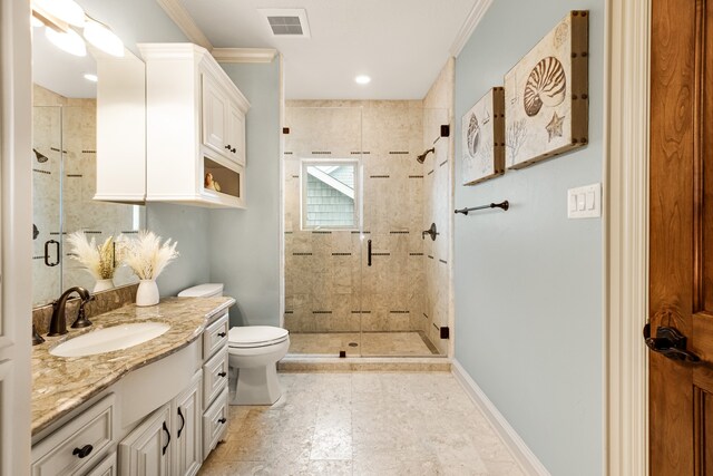 bathroom with toilet, vanity, walk in shower, ornamental molding, and tile floors