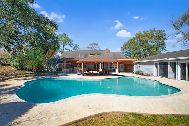 view of pool with a patio area