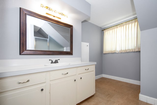 bathroom featuring vanity and hardwood / wood-style floors