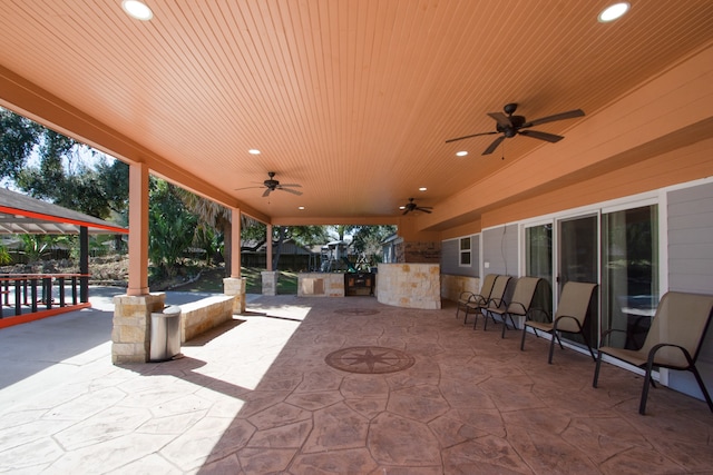 view of patio featuring ceiling fan