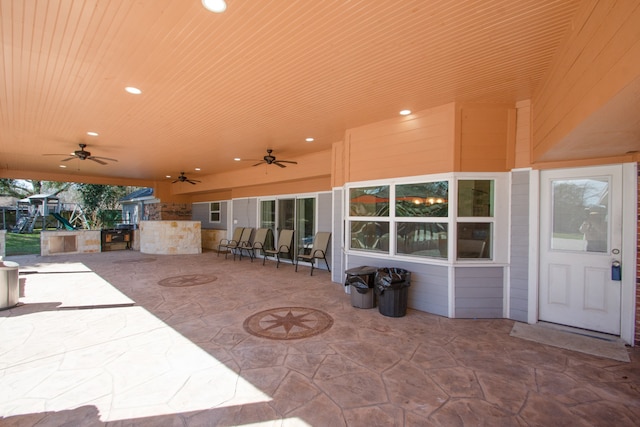 view of terrace featuring ceiling fan