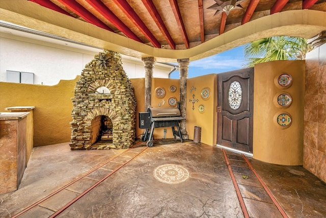 view of patio featuring ceiling fan