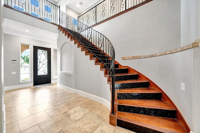 foyer entrance featuring a high ceiling