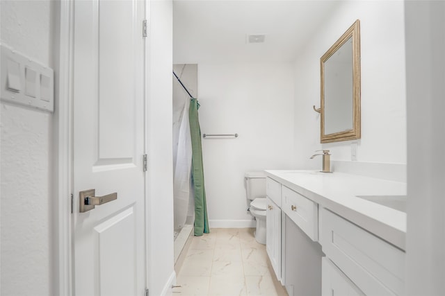 bathroom with vanity, tile floors, a shower with curtain, and toilet