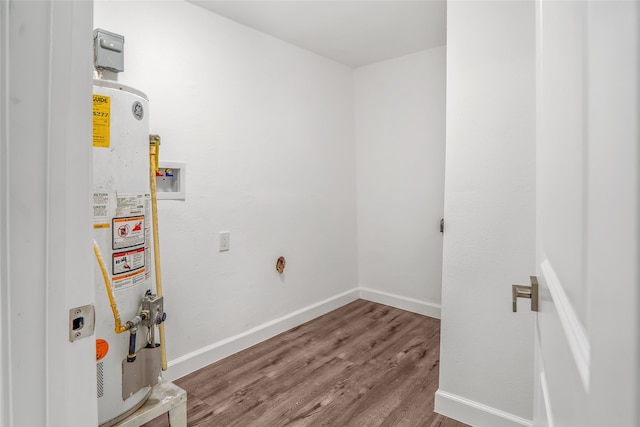 utility room featuring gas water heater