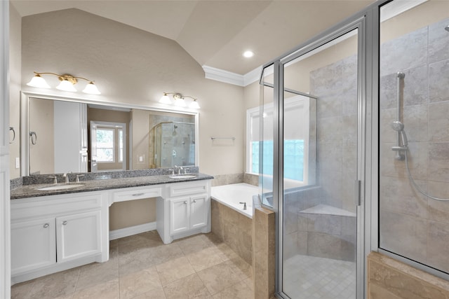 bathroom featuring lofted ceiling, separate shower and tub, ornamental molding, vanity, and tile patterned floors