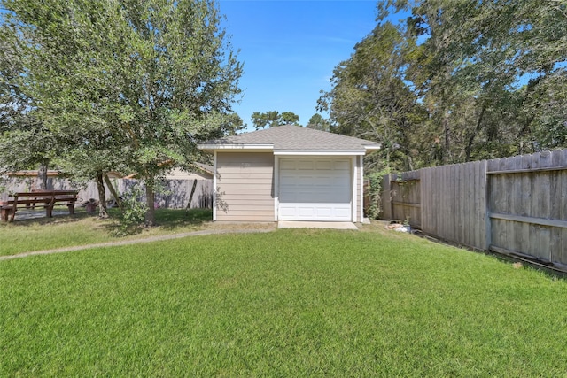 garage with a lawn