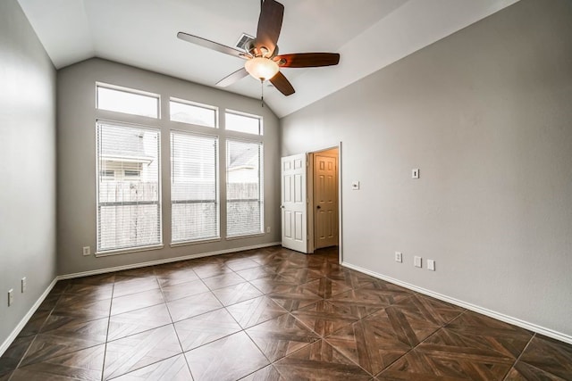 spare room featuring ceiling fan and lofted ceiling