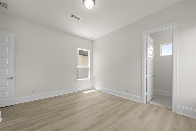 unfurnished bedroom featuring light wood-type flooring