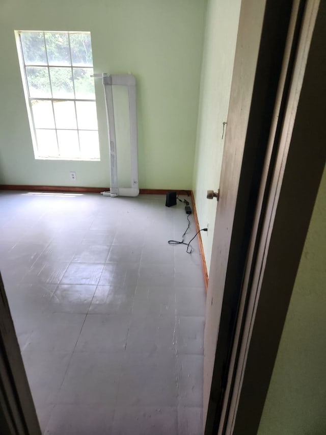 empty room with light tile flooring