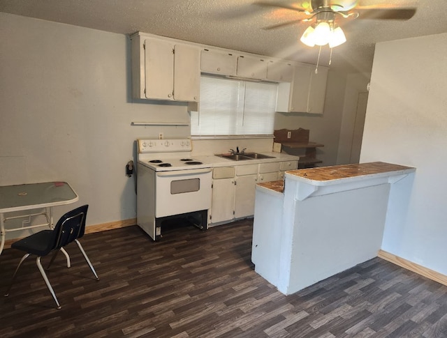 kitchen featuring dark hardwood / wood-style flooring, white electric stove, white cabinetry, ceiling fan, and sink